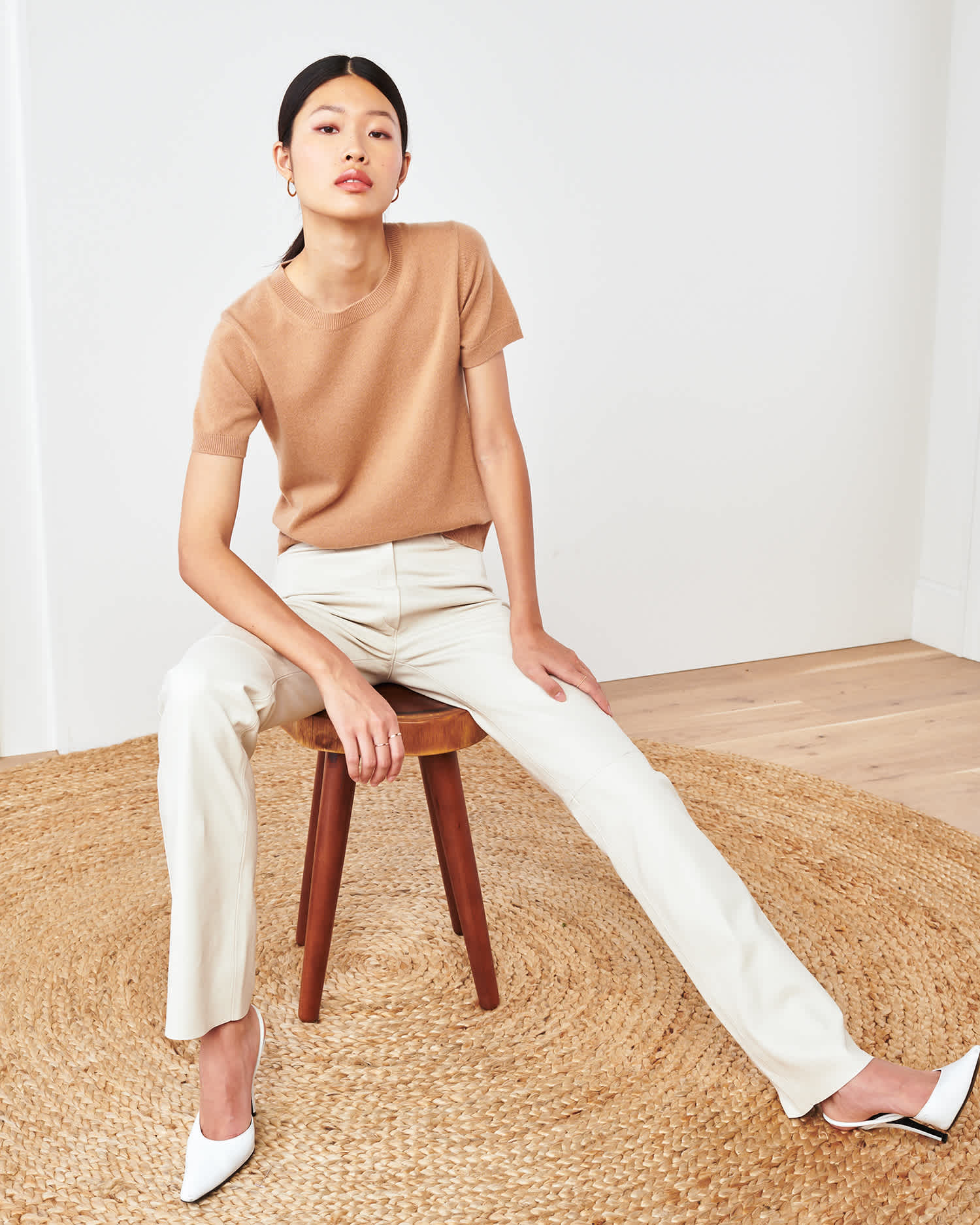 woman wearing camel cashmere tee 