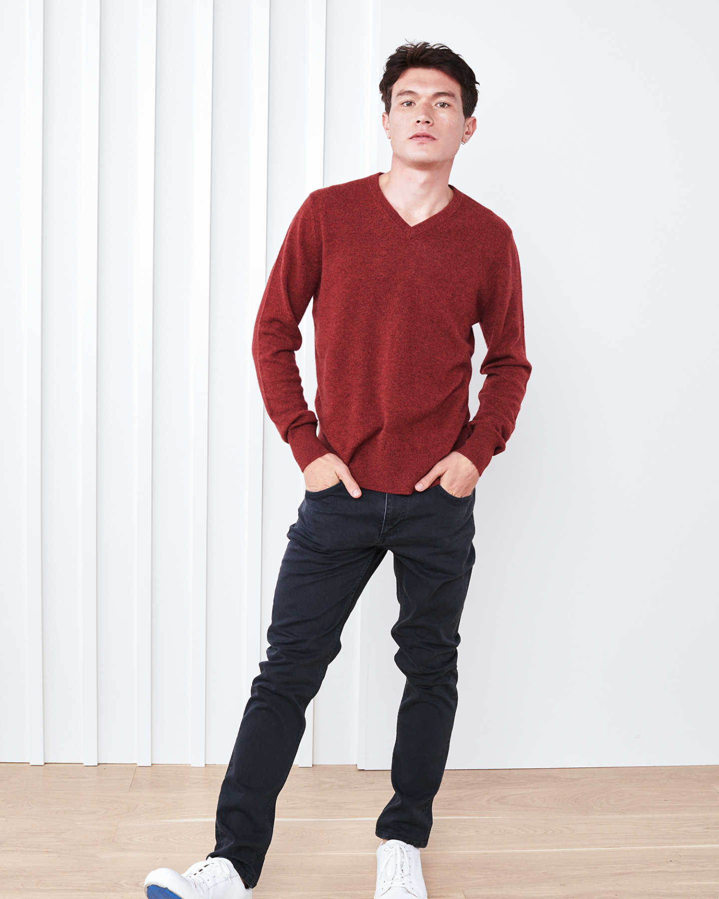 Man wearing red cashmere v-neck sweater for men standing
