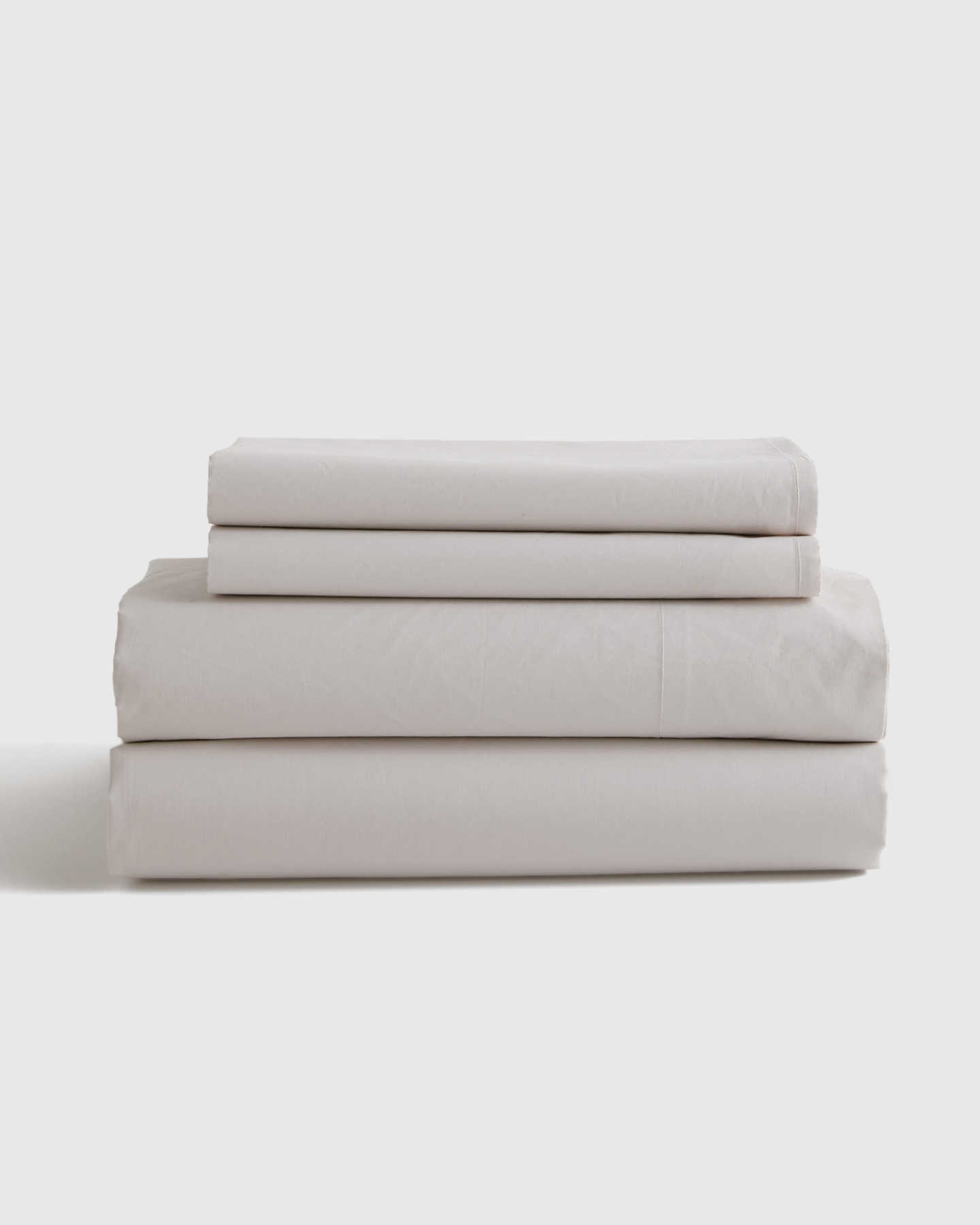 Organic percale sheet set in sand