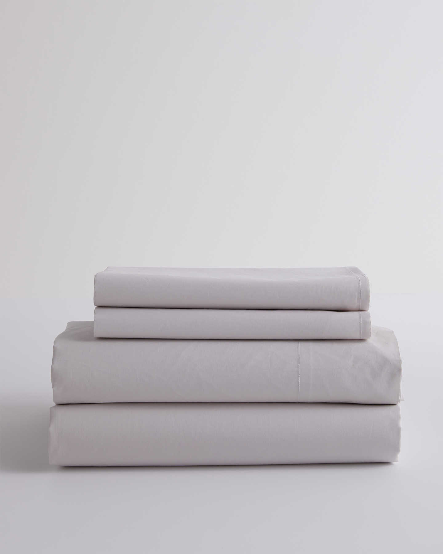 Organic percale sheet set in sand