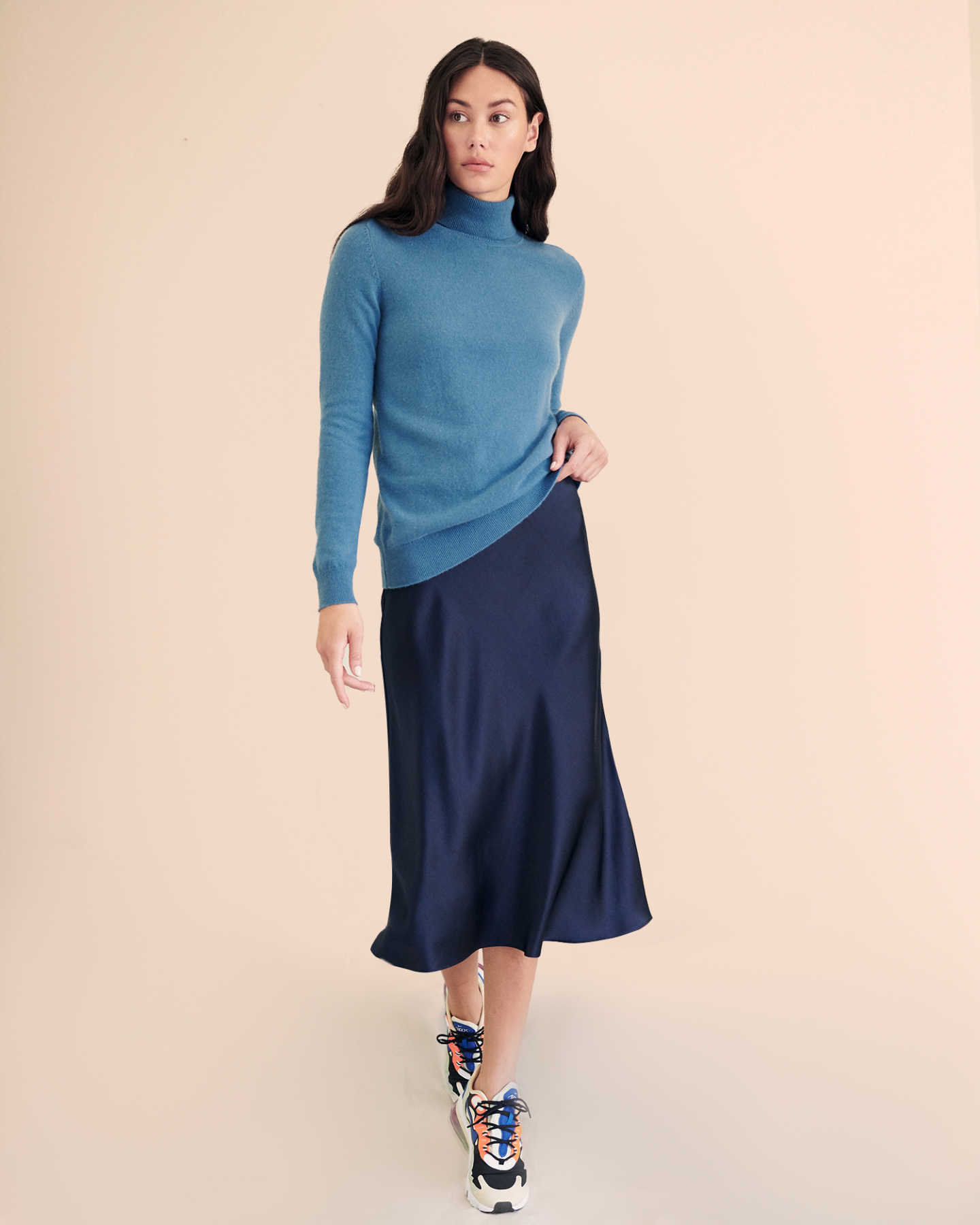 Woman wearing navy silk skirt