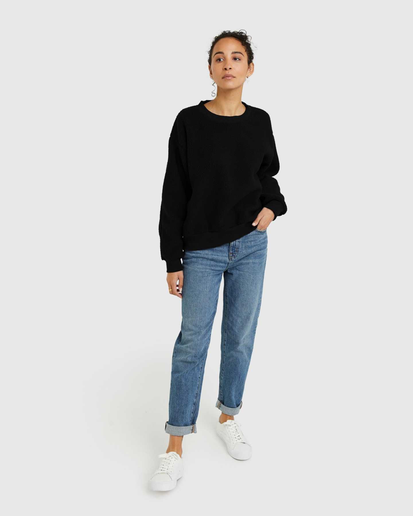 woman wearing sherpa crewneck sweatshirt in black