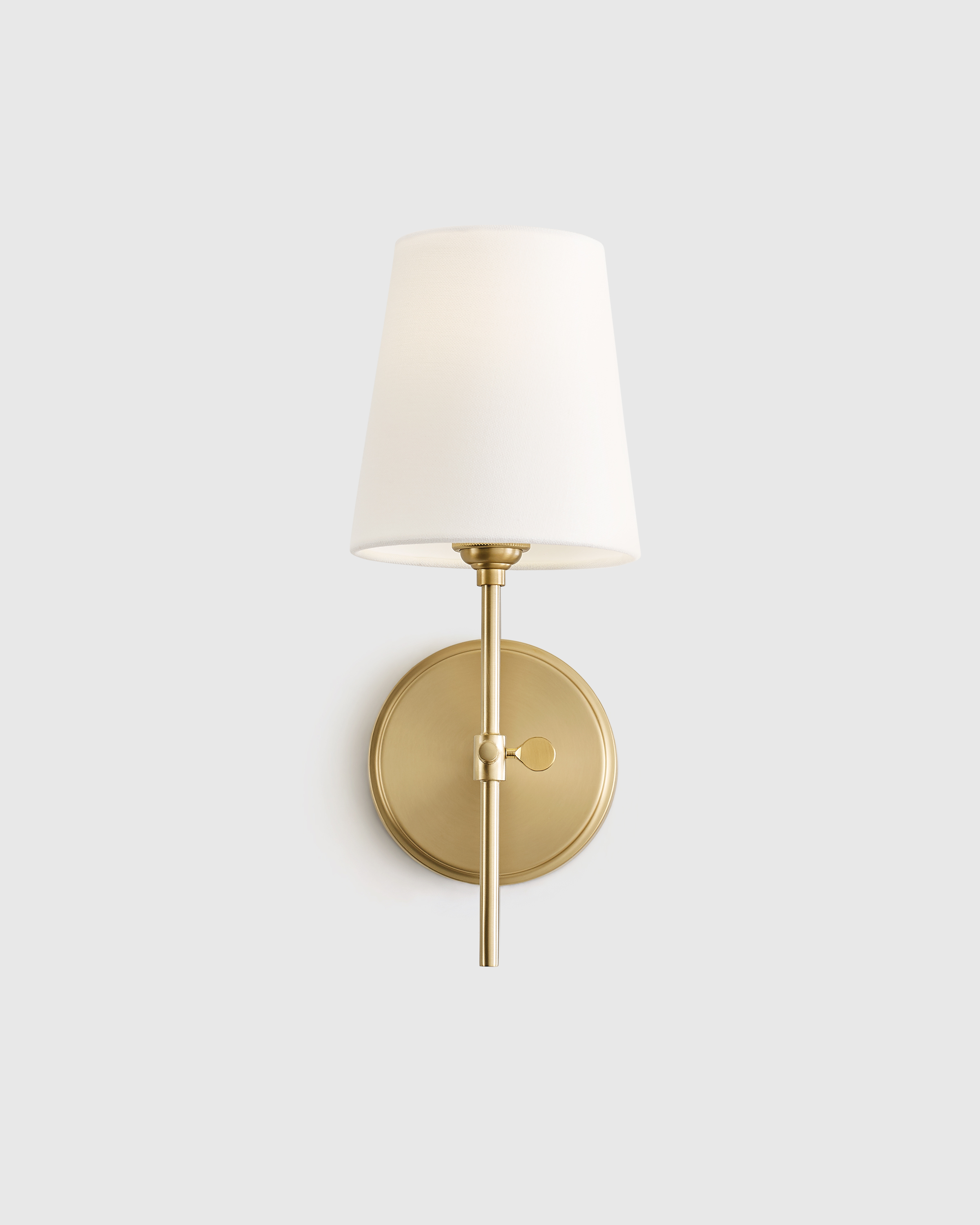 Linear Steel Sconce with Linen Shade in Brass