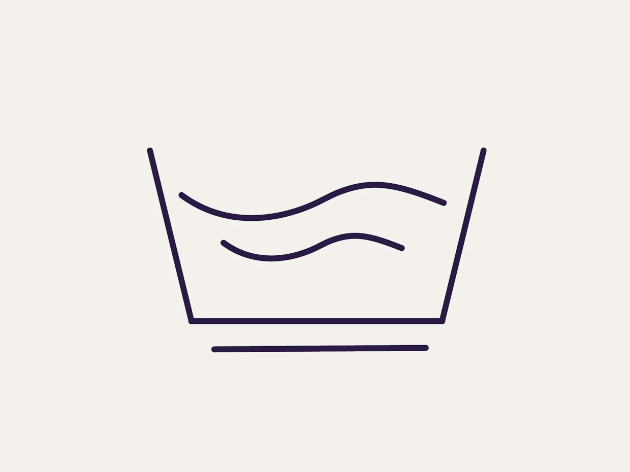 Symbol für Maschinenwäsche, ein stilisiertes Waschbecken mit zwei Wellenlinien auf beigefarbenem Hintergrund.