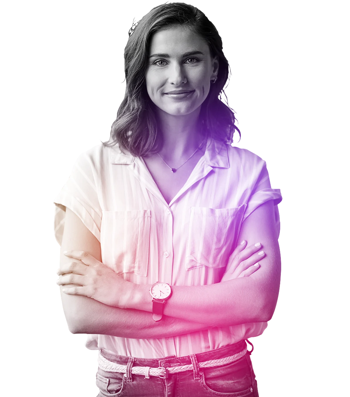 Smiling woman in office attire stands with her arms crossed.