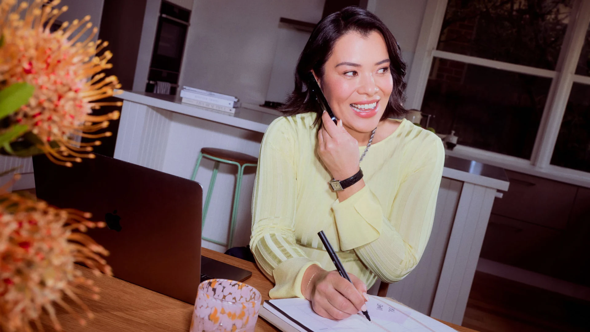 Woman working on her mobile phone