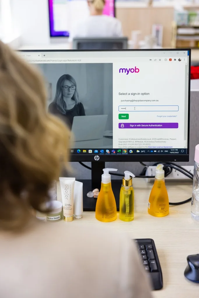 Female-at-desk-with-MYOB-on-monitor