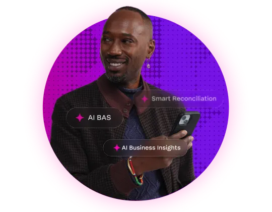 Person in suit using smartphone with digital labels for Business Insights and Smart Reconciliation against purple background.