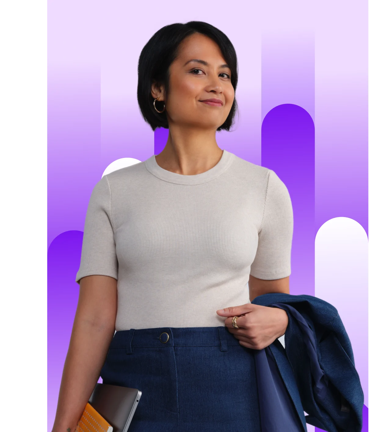 Confident bookkeeper with short dark hair wearing a beige ribbed top and dark blue pants, holding a jacket and a laptop/notebook under her arm, posing against a purple gradient background.