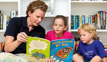 Woman-reads-to-two-young-children