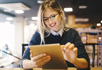 Image of a student reading books