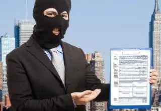 Tax Fraud Hacker With Stolen Tax Document Mobile