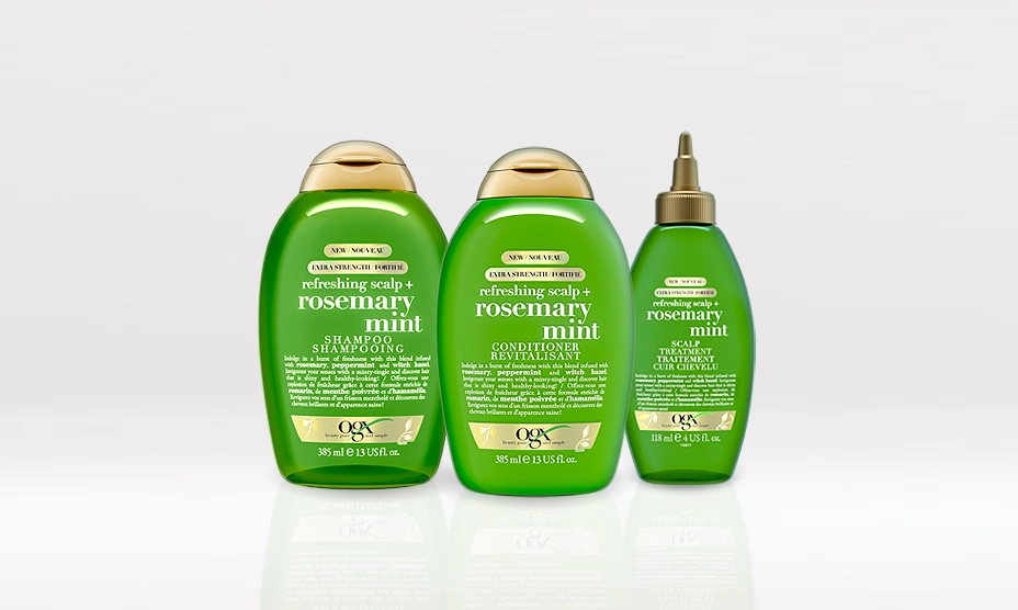 Une bannière présentant trois produits capillaires clarifiants arbre à thé et menthe d’OGX®