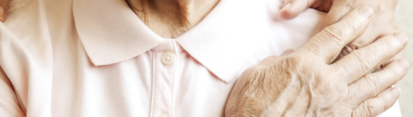 Old person holding hands