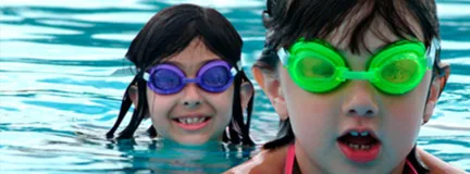 Children swimming in pool