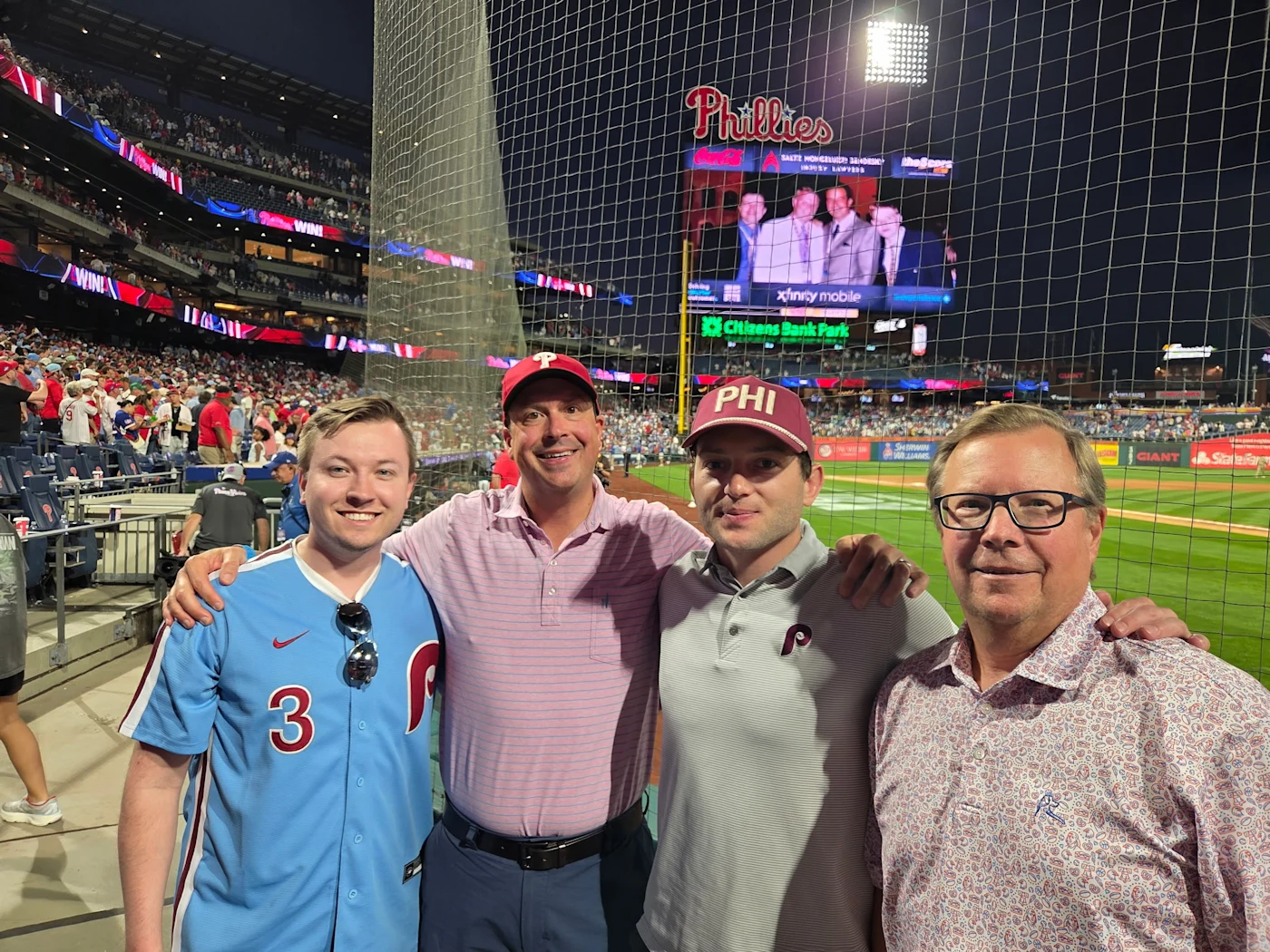PHLY representatives and agents at a Phillies game, sitting in the Philadelphia Insurance Club located behind home plate at Citizen's Bank Park.