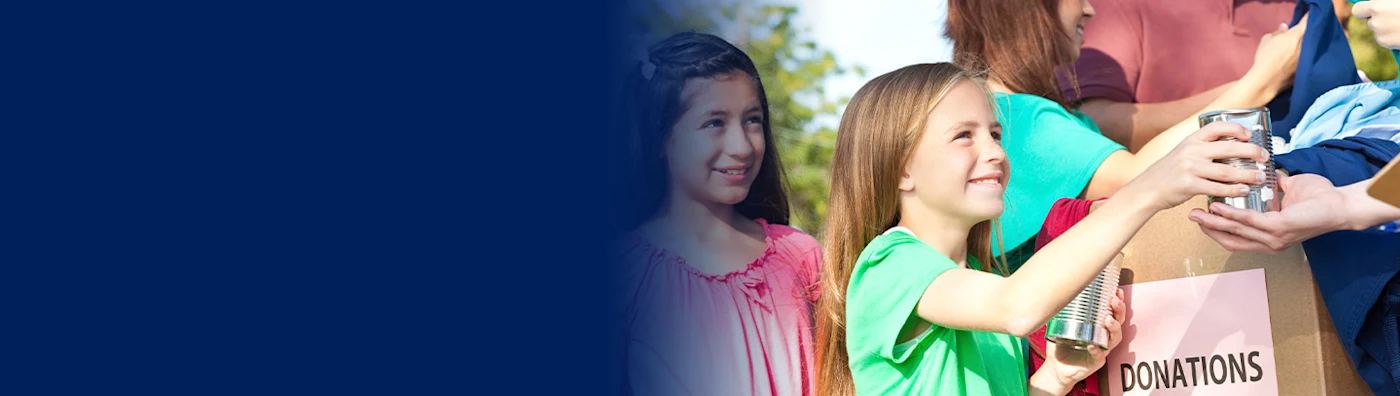 Two children collect donations - note blurred out left half of image