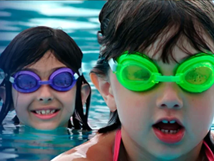 Two young swimmers in a pool 