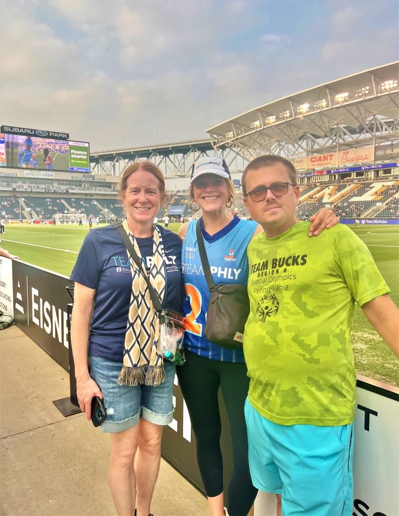 Special Olympics of Pennsylvania (SOPA) participants accept a check from Philadelphia Insurance Companies at Subaru Park during a Philadelphia Union game.