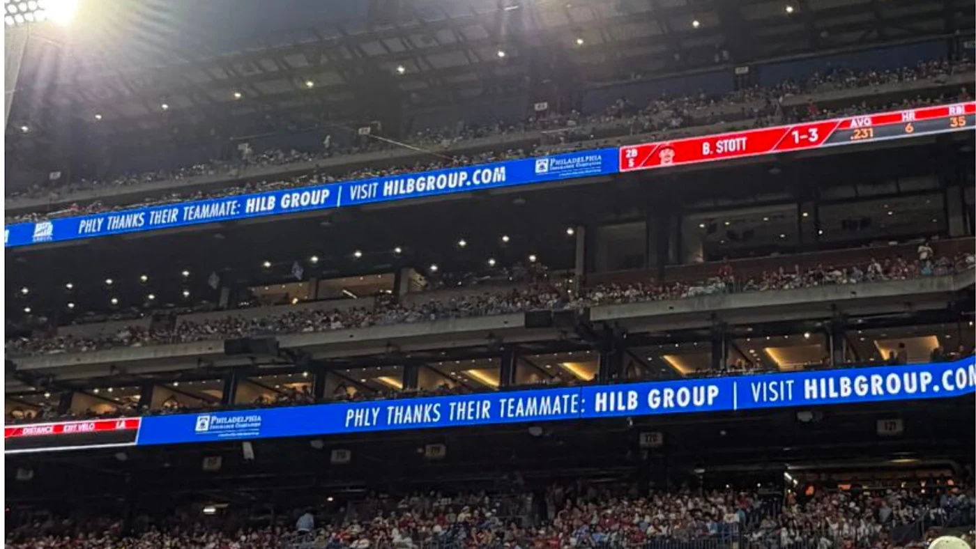 PHLY Teammates scrolling in the stands.