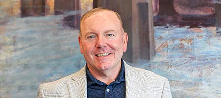 Headshot of John Doyle, Executive Vice President & Chief Underwriting Officer