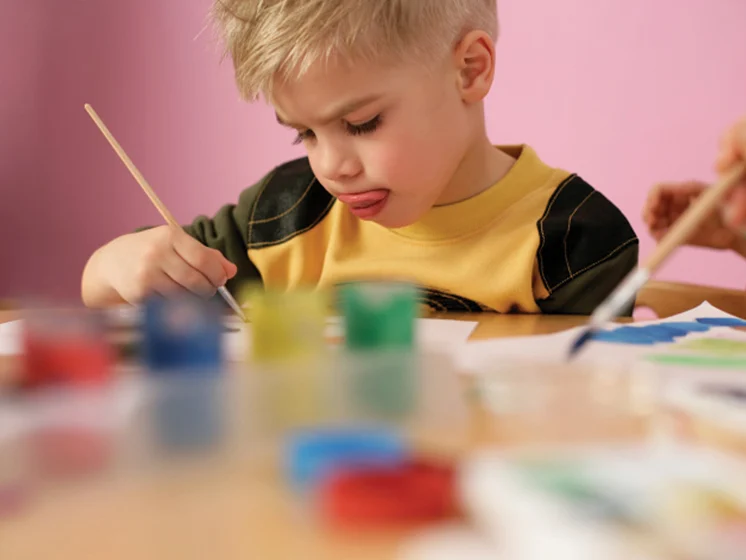 Young child painting