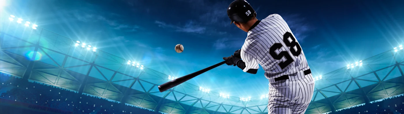 Baseball player at bat and swinging for a pitch