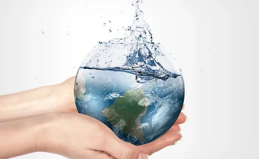 Hand holding sustainable earth globe