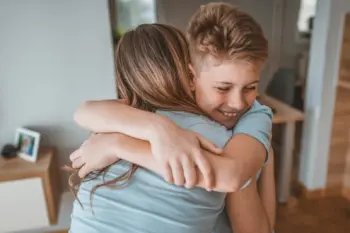 Child hugging their mum