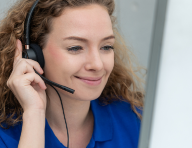 Customer support advisor on the phone with a member handling their query.