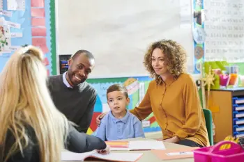 Family in a feedback session at Explore Learning