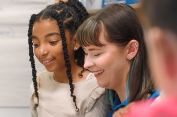 Tutor working with a child