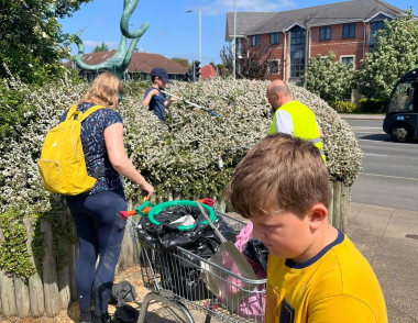 Harry and volunteers picking up rubbish from their local area. 