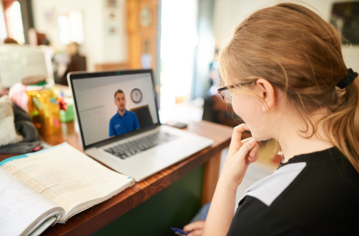 Girl taking an online maths and English tuition session with an Explore Learning tutor.