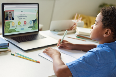 Boy learning at home on Compass home screen