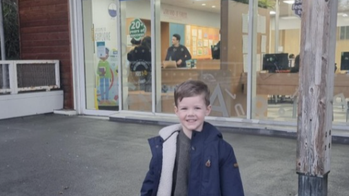 Child outside an Explore Learning centre