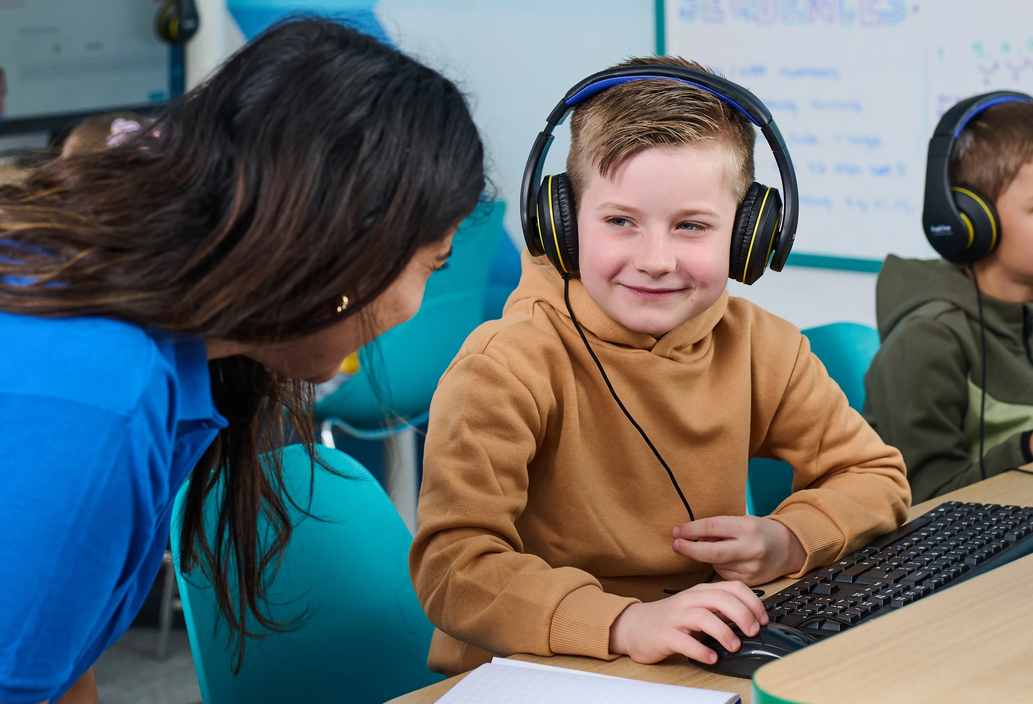 Happy SEND child learning in an Explore Learning centre