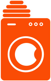A pictogram of a washing machine with folded clothes on top