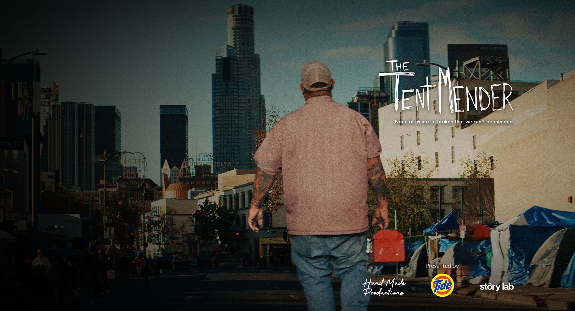 Poster for the documentary film The Tent Mender showing a man shot from the back with a toolbox in his hand and a big city in the background