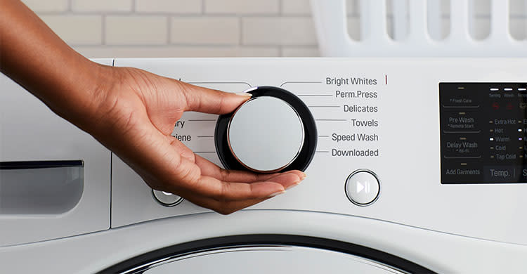 Select the wash cycle and water temperature on your washing machine
