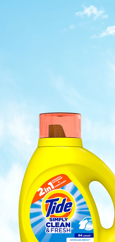 A bottle of Tide Simply Clean and Fresh Liquid Laundry Detergent Refreshing Breeze in front of a clear sky background