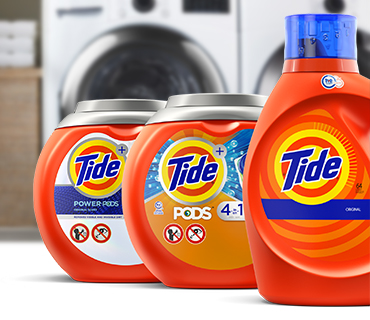 Tide Liquid and PODS products in front of a washer