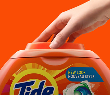 The top part of a Tide PODS box showing how secure it is