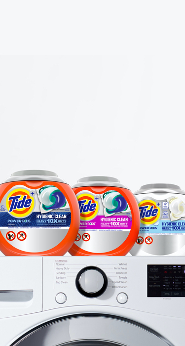 A range of Tide PODS products on top of a white washing machine