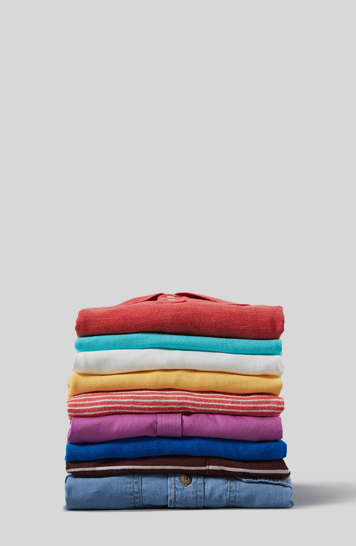 A pile of neatly folded, colorful clothes