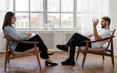 a doctor talking to a patient