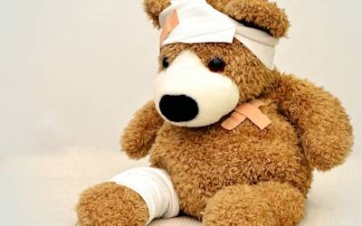 teddy bear dressed as patient