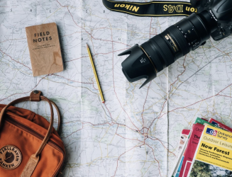 Camera, maps, and bag