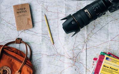 Camera, maps, and bag