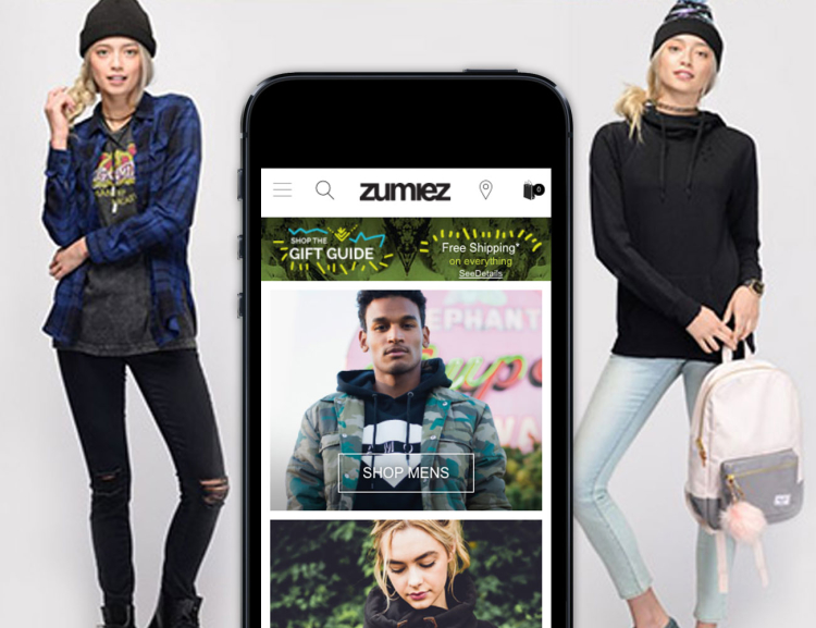Zumiez website is shown on a mobile device with women modeling clothes in the background